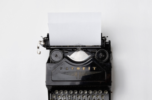 black typewriter on white background