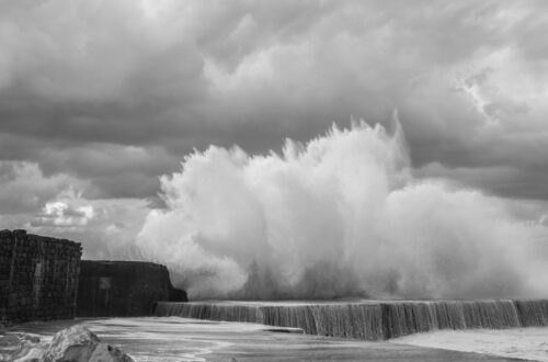 stormy sea hitting on high rocks