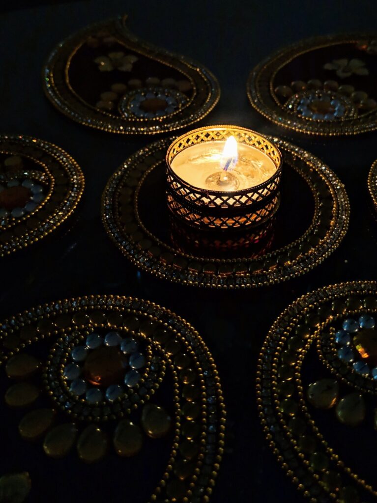 traditional Indian diya lit up